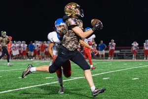 University's Luke Hudson breaks school passing record but Hawks fall to Wheeling Park 55-33